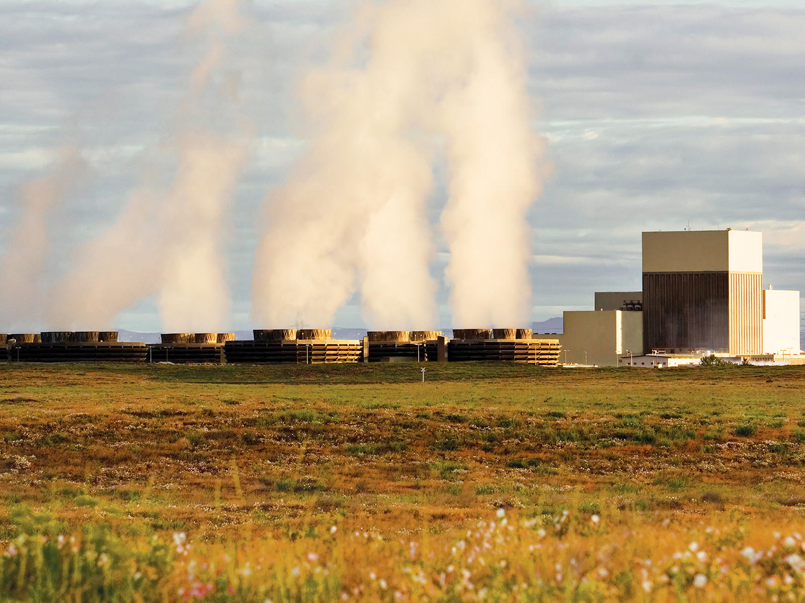 Washington state's only commercial nuclear power plant is located in the arid desert near Richland. The buildings let off clouds of steam as hot air is released.