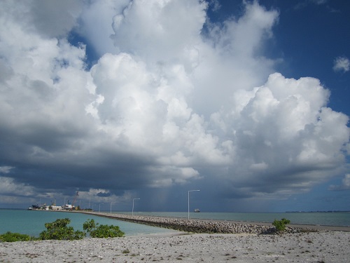 Clouds looming over water