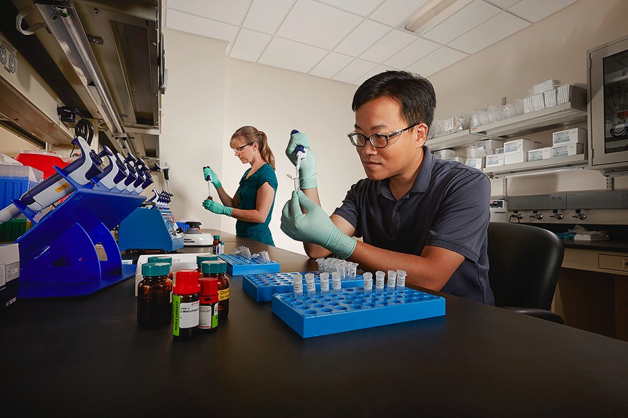 researchers in lab