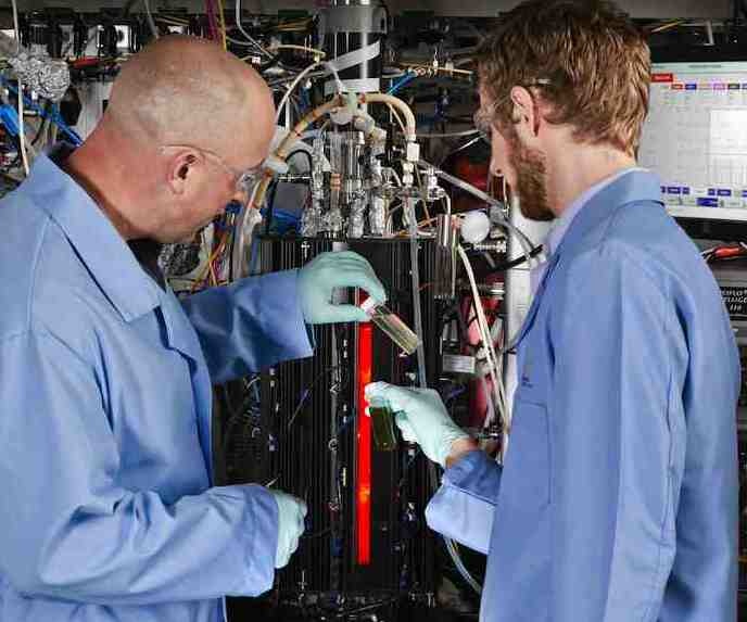 PNNL researchers with photobioreactor