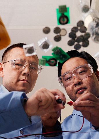 Researchers studying batteries