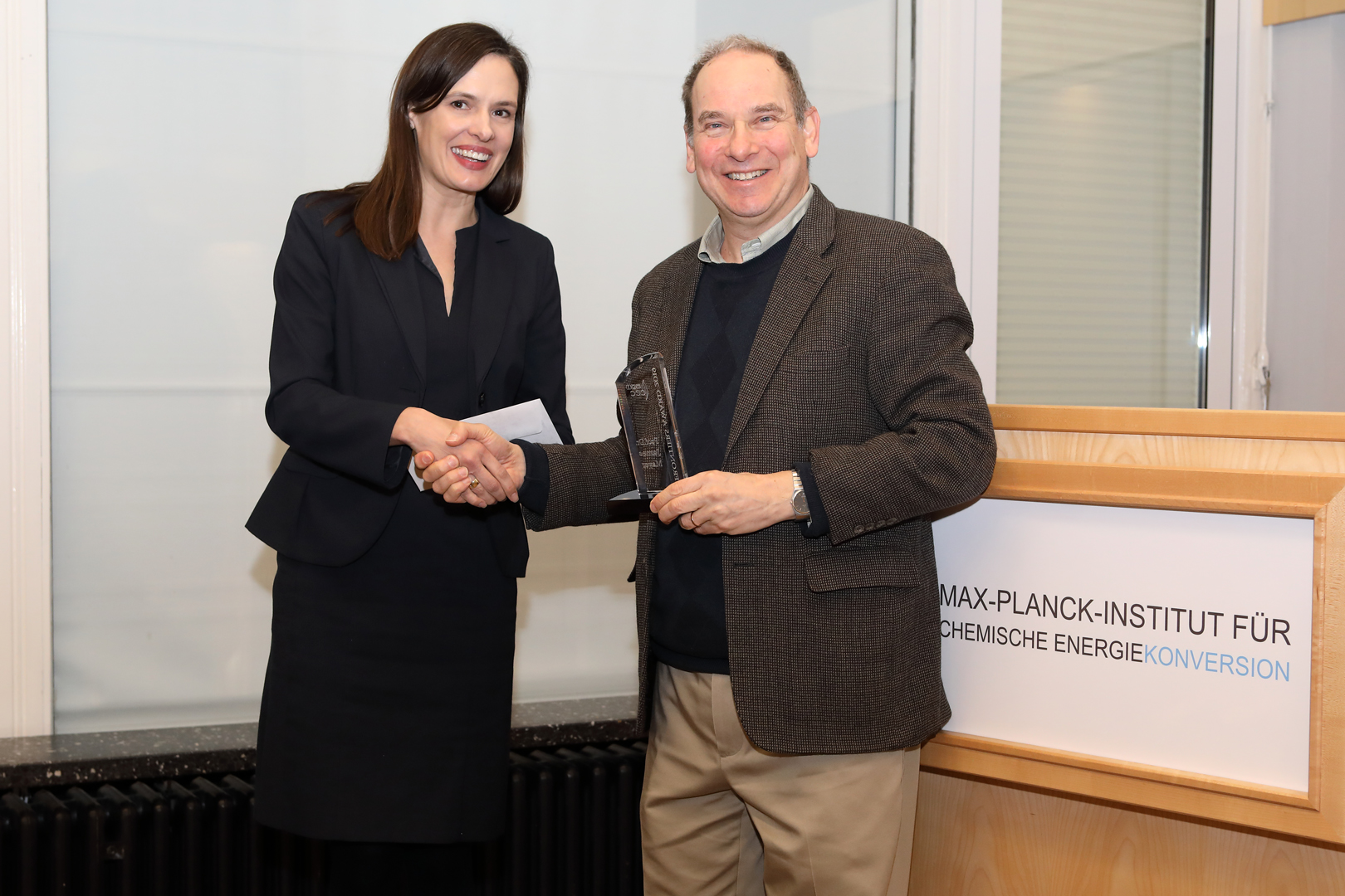 Jim Mayer receiving his award at Max Planck Institute