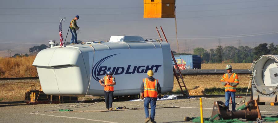 Men in safety vests at beer plant