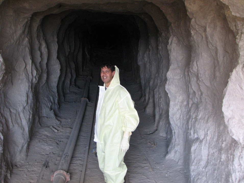 Brian Milbrath entering an old tunnel
