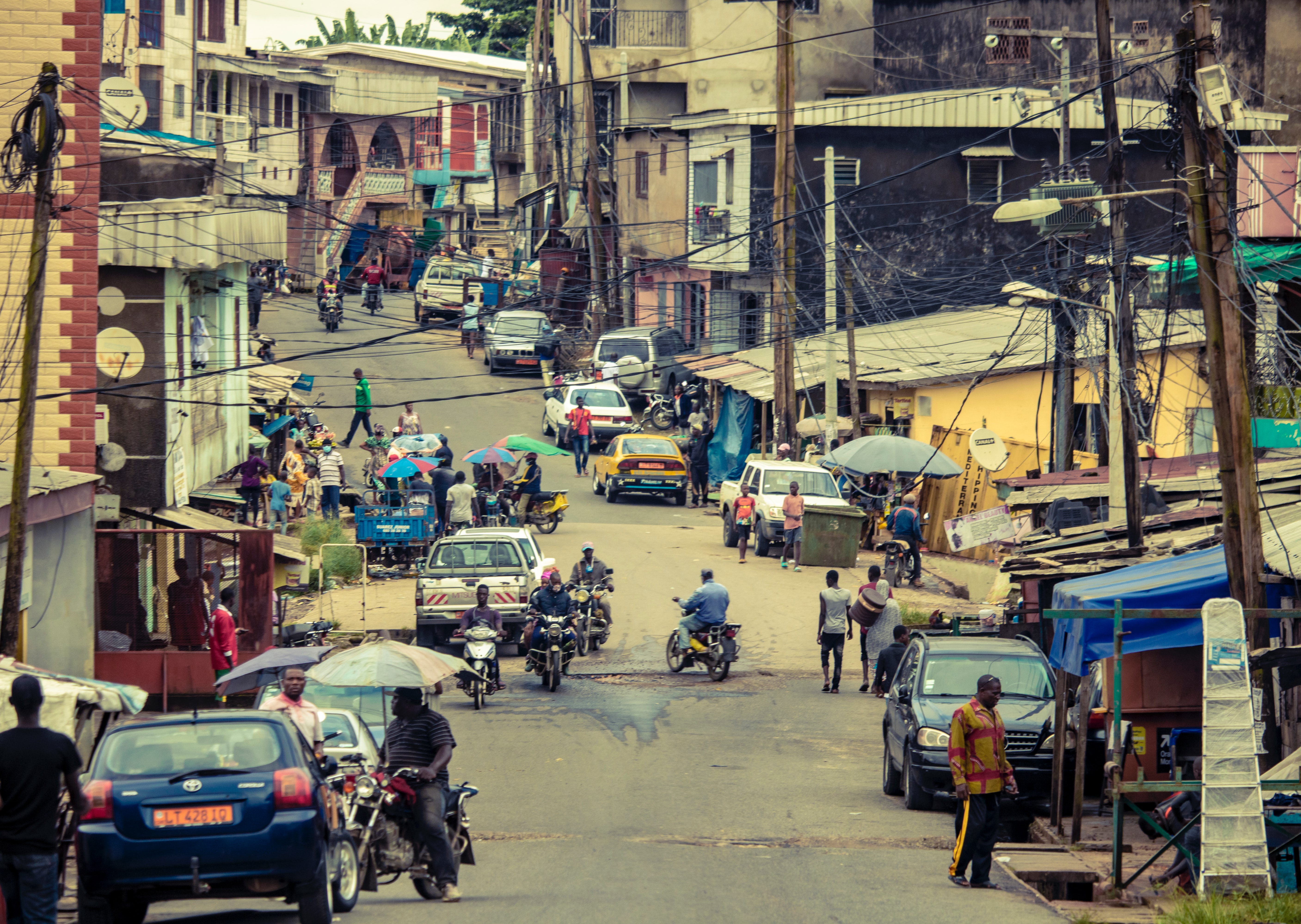 A busy street full of motorized vehicles in Cameroon