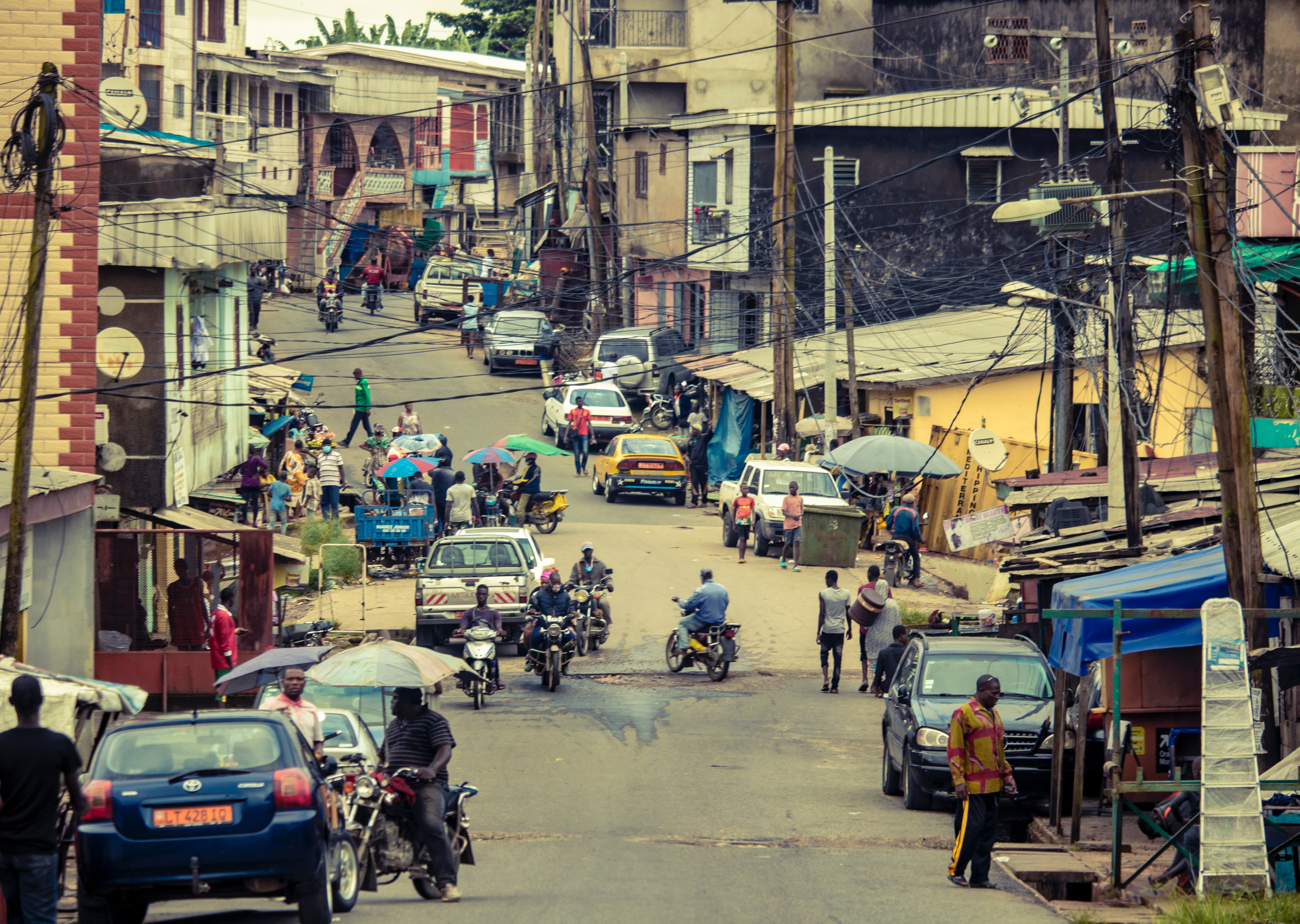 A busy street full of motorized vehicles in Cameroon