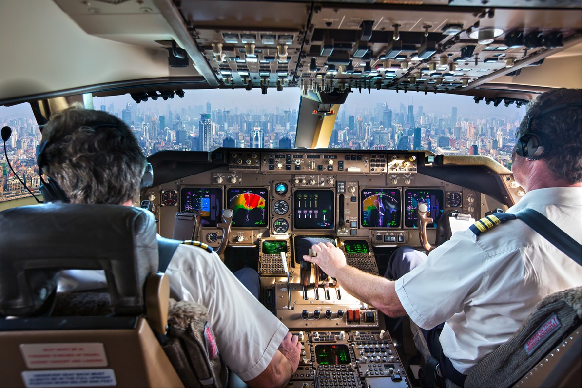 Pilots in the cockpit of a plane