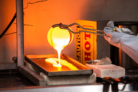 Liquid glass dripping onto a surface