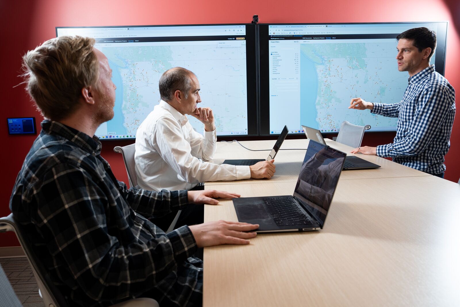 PNNL researchers conversing