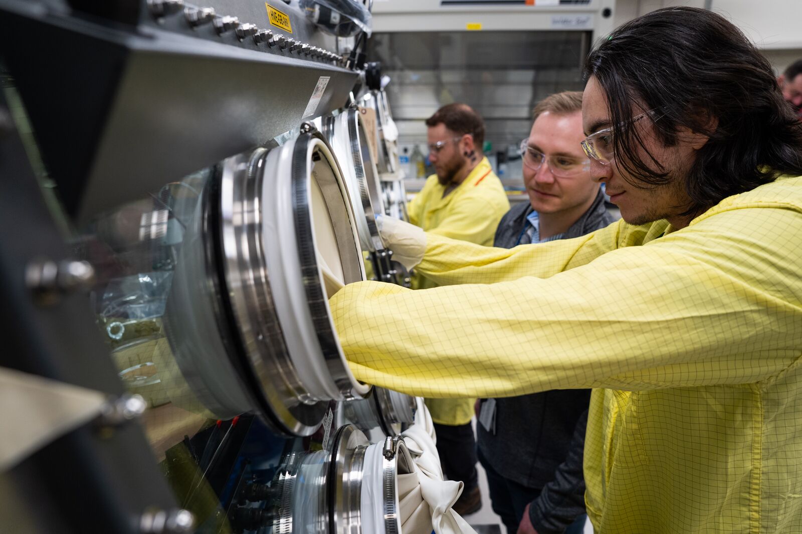 Photo of researchers at the JASPER glovebox