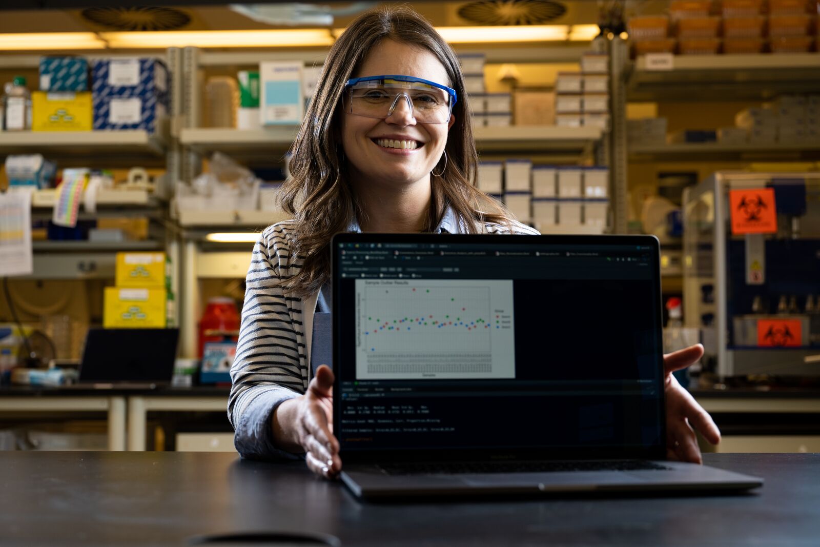 Kelly Stratton, a biostatistician and leader of the Data Transformation Integration Research Platform, works with EMSL users to explore datasets from a variety of instrumentation for studying metabolomics, proteomics, and lipidomics. (Photo by Andrea Starr | Pacific Northwest National Laboratory)