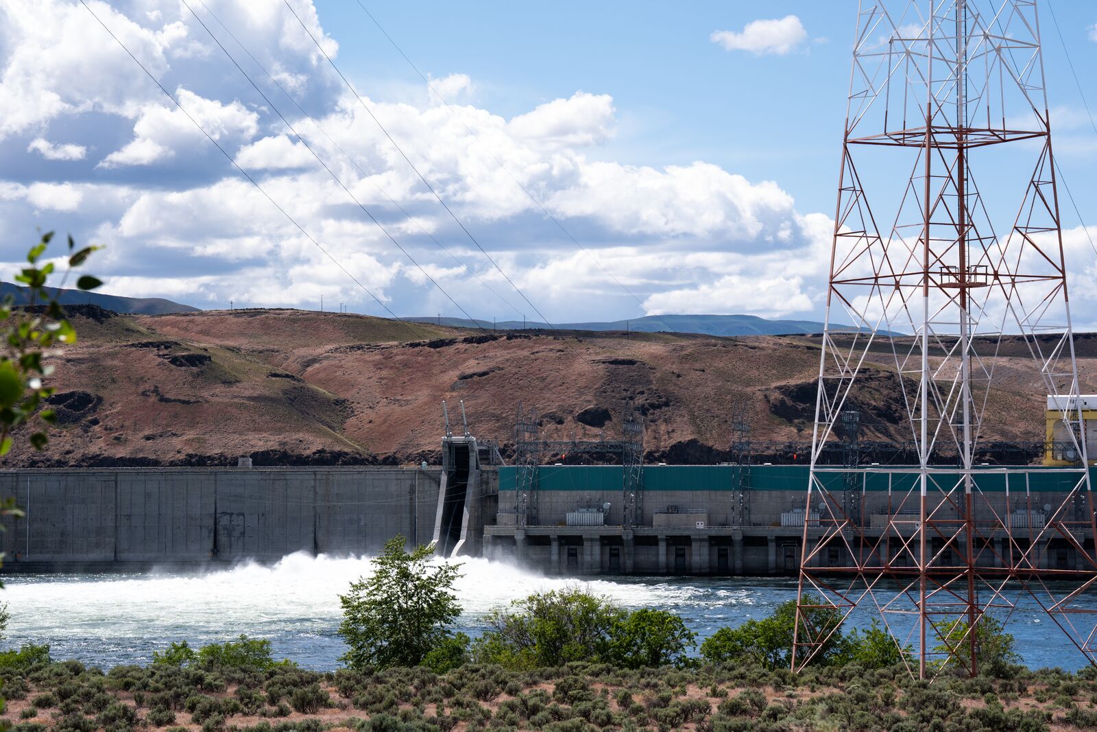 Wanapum dam with water coming out of the dam's waterways