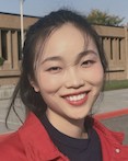 Yatong Zhao is a PhD intern with the IDREAM EFRC. She is standing outside and wearing a red jacket.