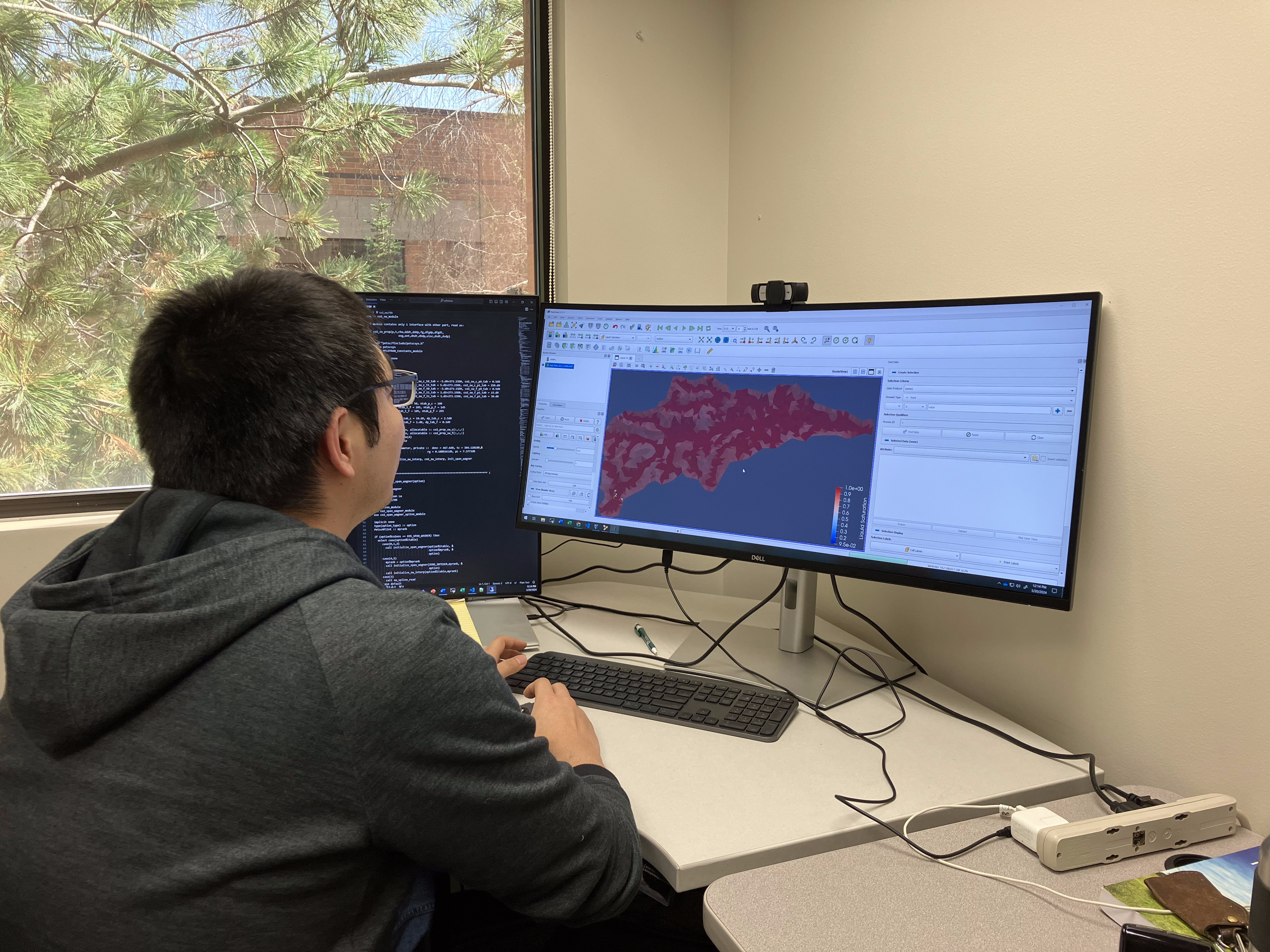 Yi Xiao at a computer