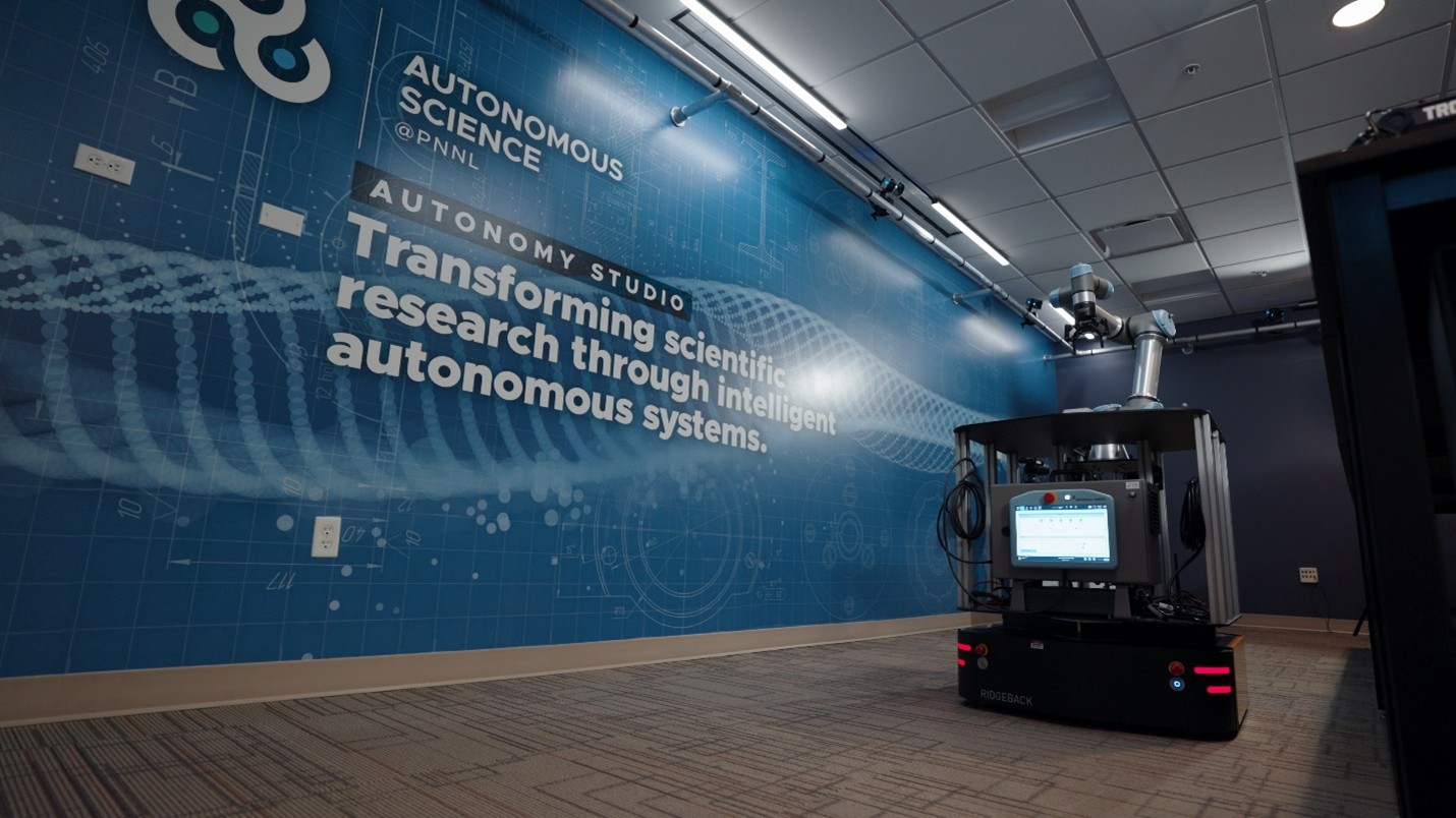 A robot on wheels inside of a room