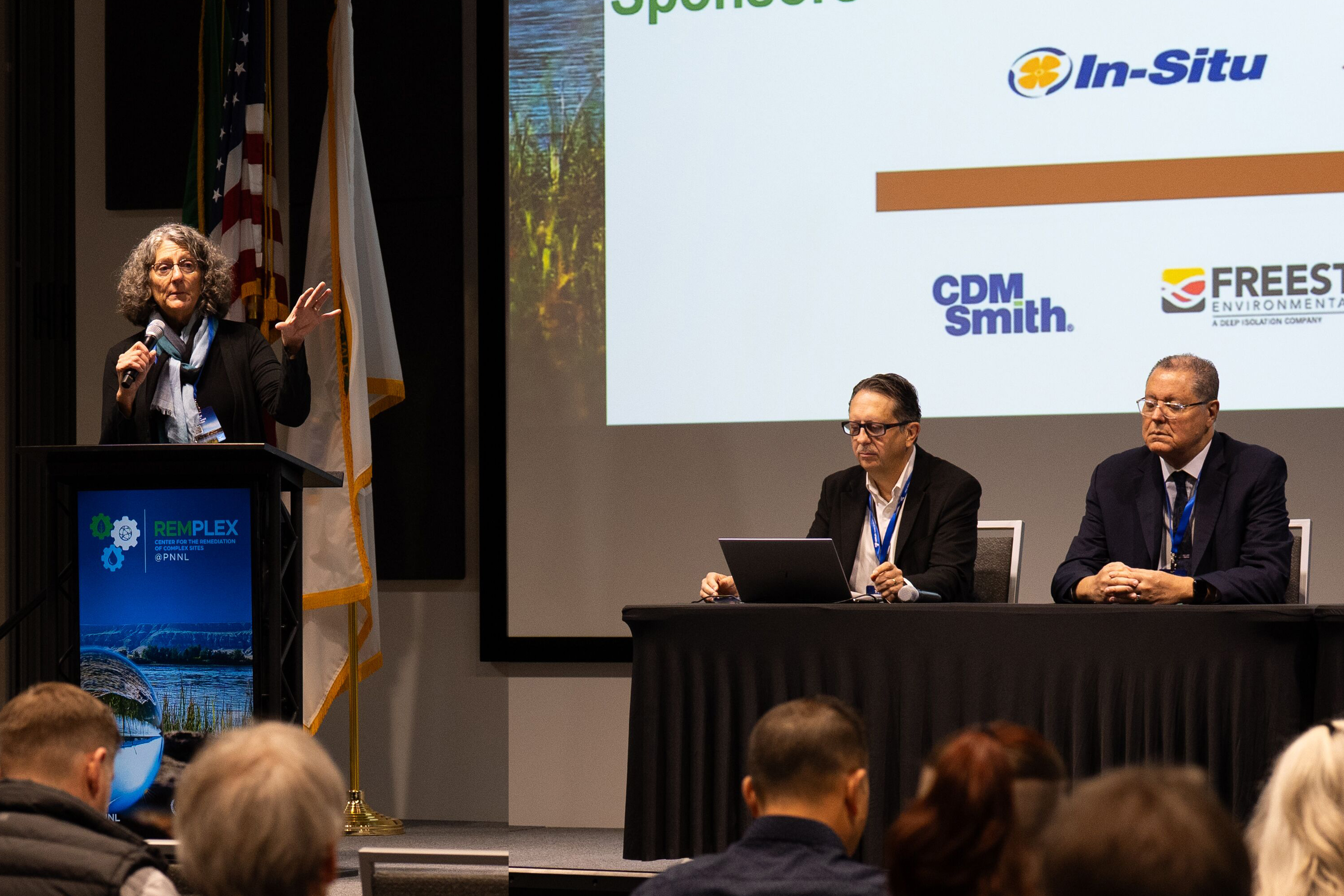 Karen P. Smith opens the 2025 Global Summit on Environmental Remediation. Seated are PNNL's Tom Brouns, center, and IAEA's Horst Monken-Fernandes.