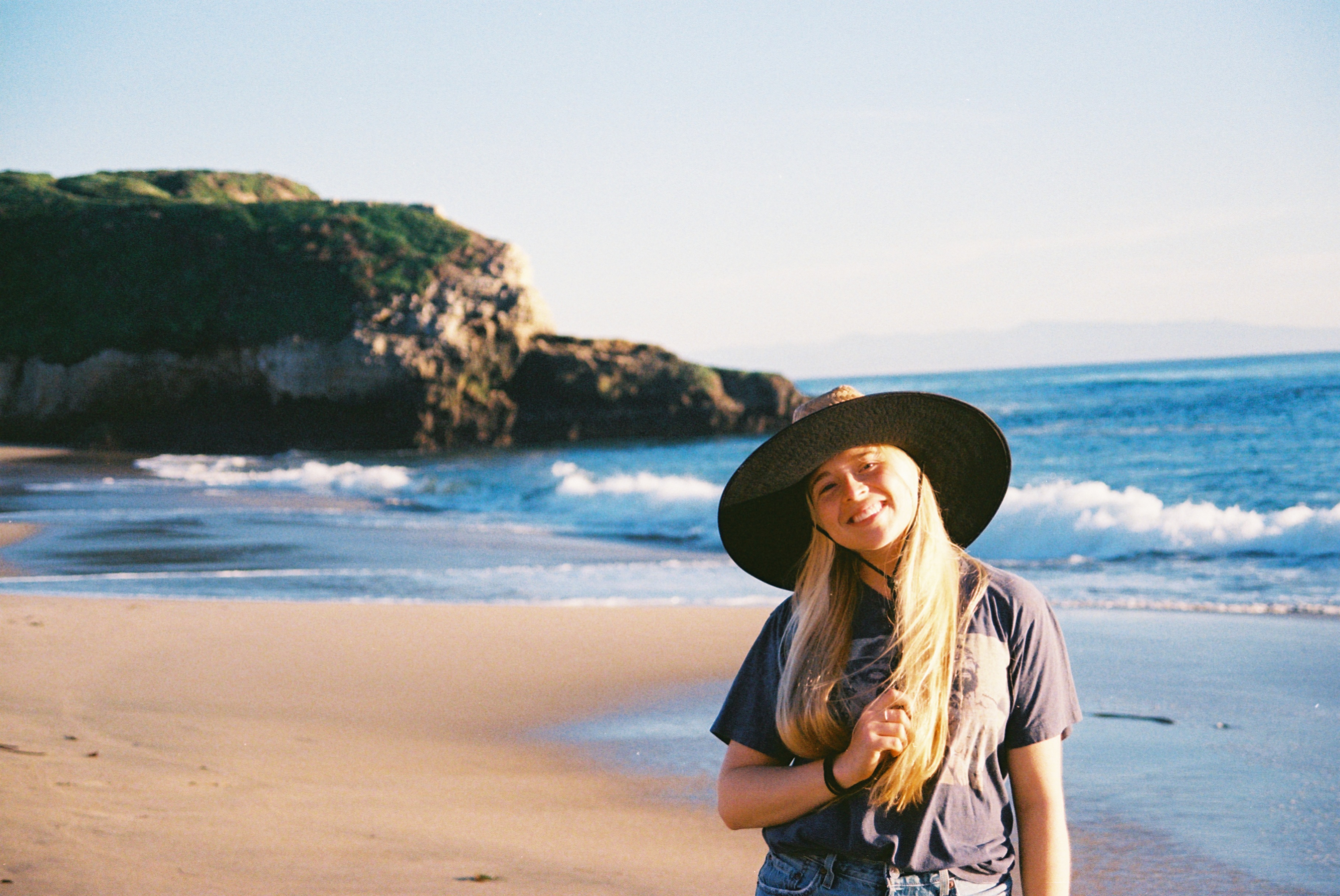 Marg Daly smiling on the beach 