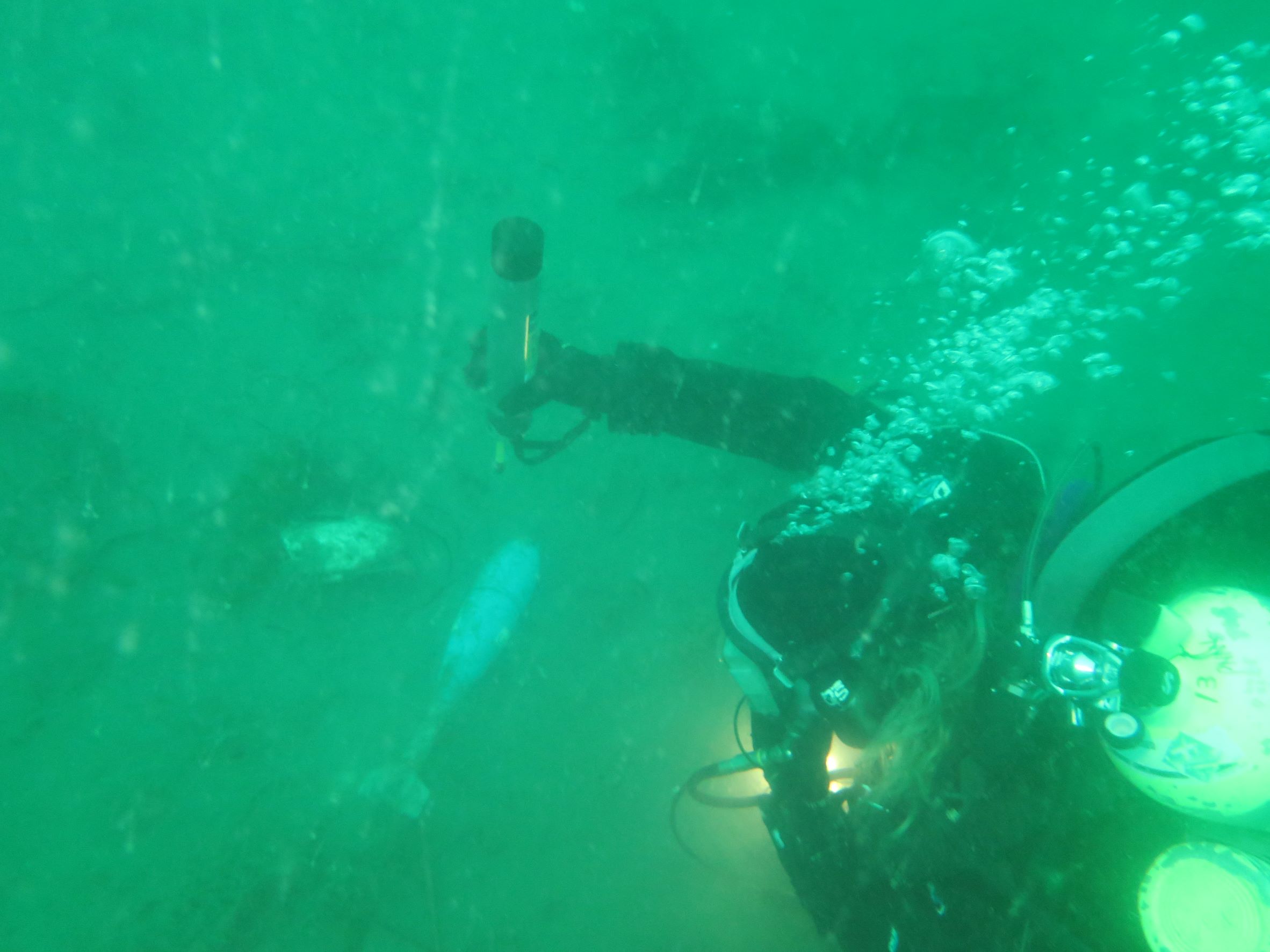 PNNL divers conducting geolocation surveys at the Sequim Bay demonstration site.