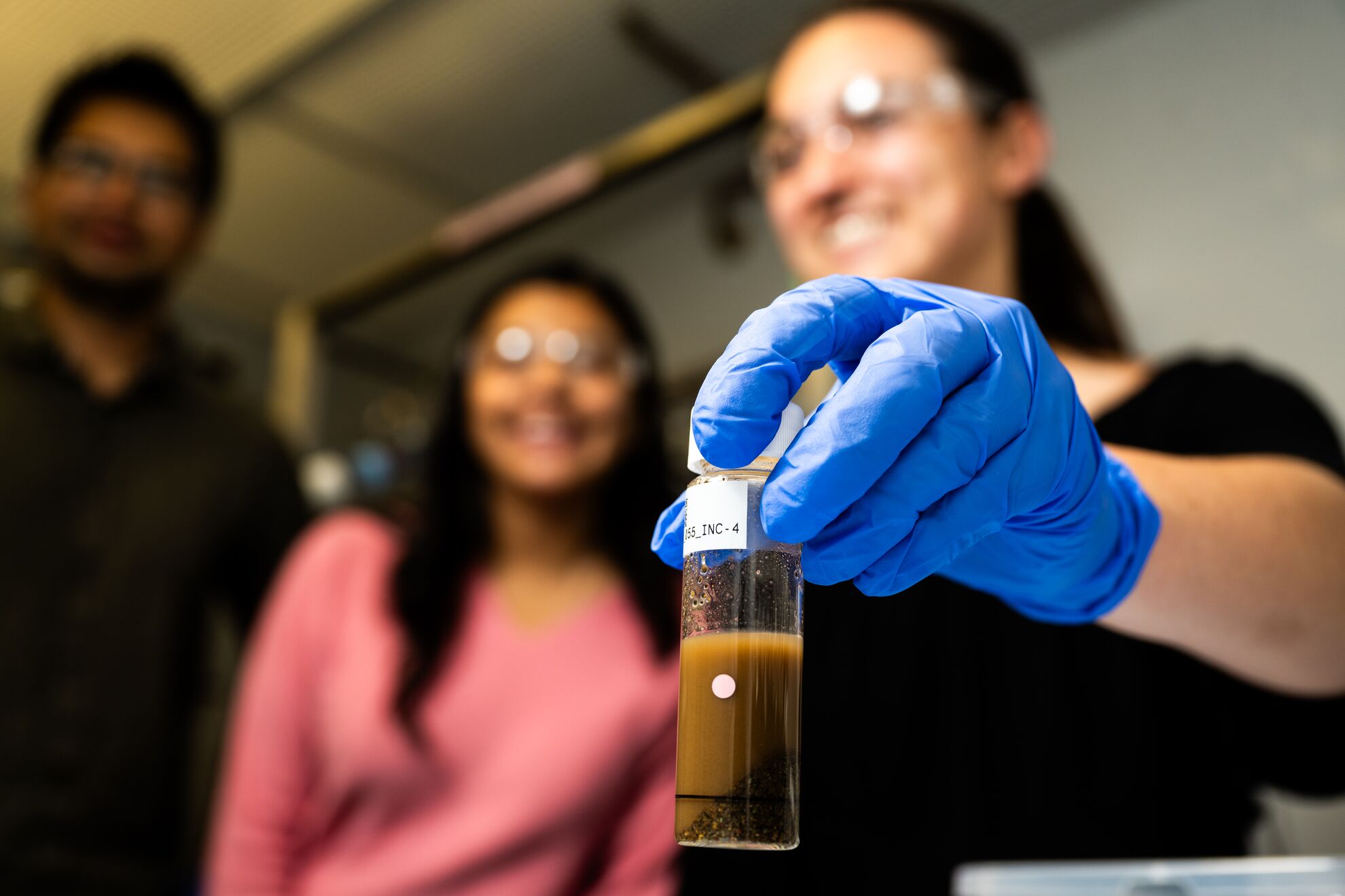 An image of someone holding a sample of sediment.