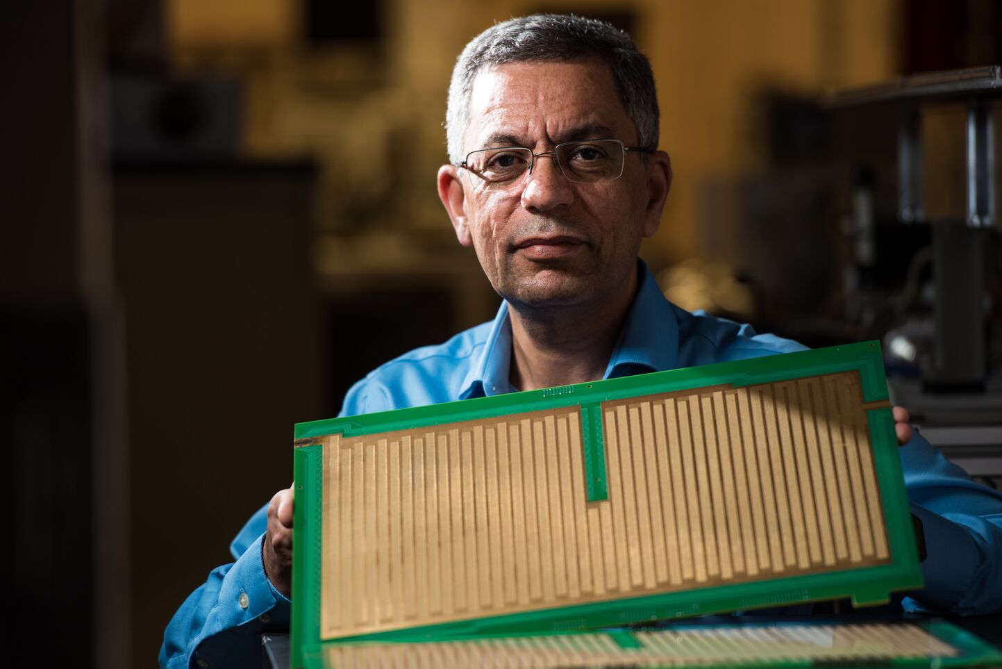 Yehia Ibrahim with the SLIM device