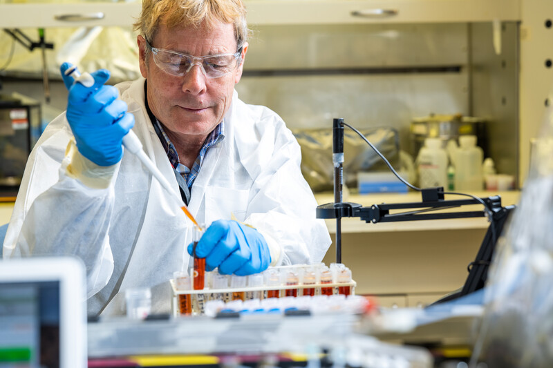 Jim Szecsody separates effluent samples in laboratory