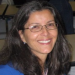 Photo of a woman wearing glasses. 