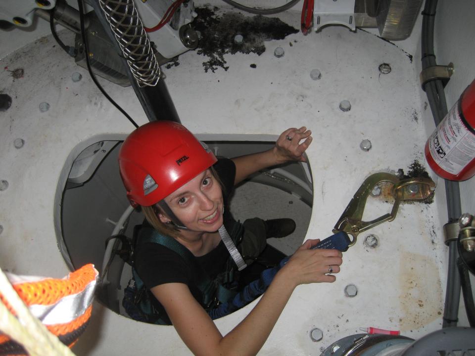 Woman in red hard hat