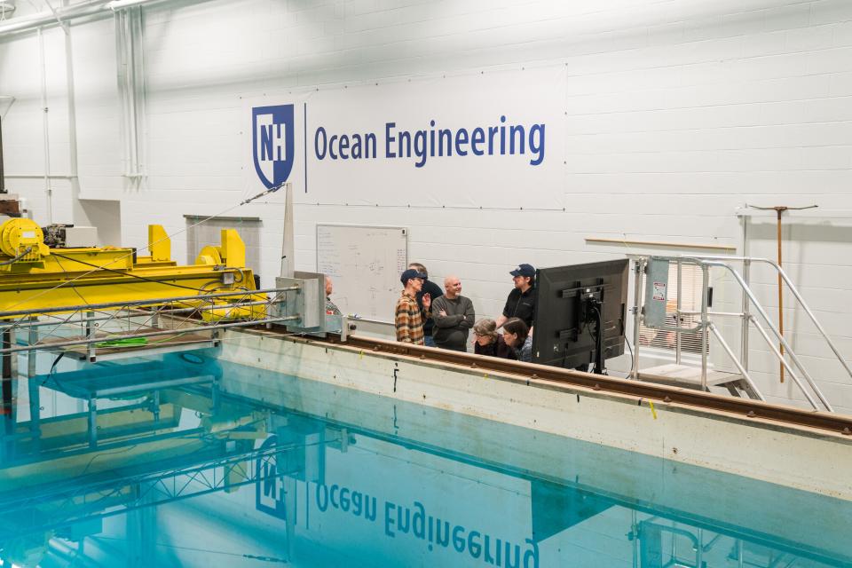 Garrett Staines supervising tank tests at the University of New Hampshire. 