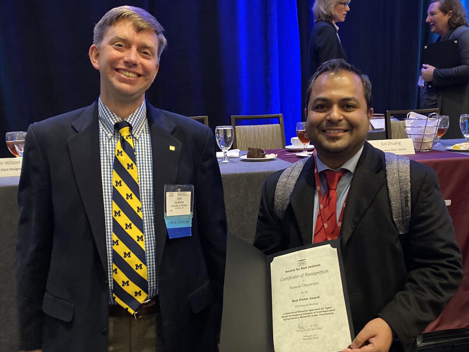 Society for Risk Analysis president Seth Guikema with PNNL researcher Sam Chatterjee