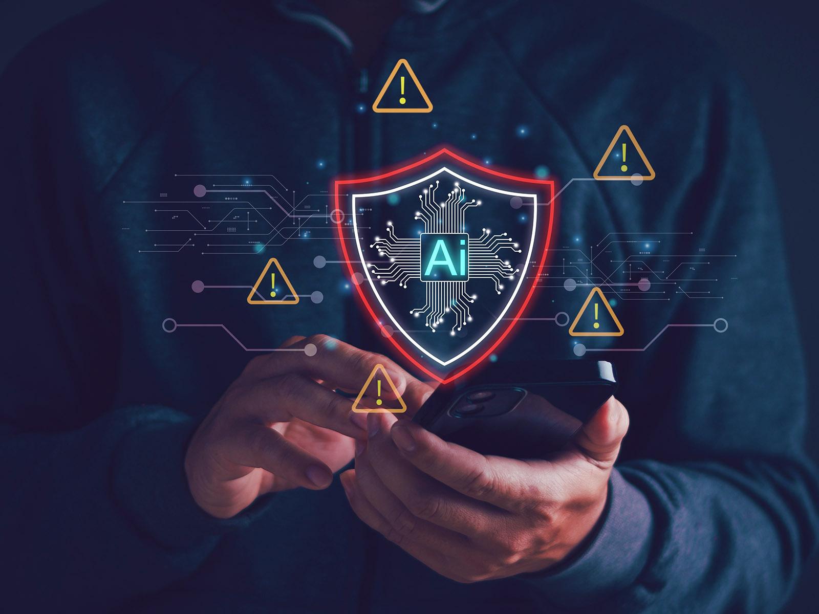 Image of a shield and warning signs superimposed over hands using a cellular telephone