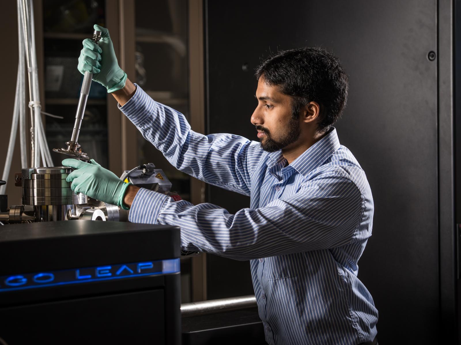 Arun Devaraj at work in the lab.