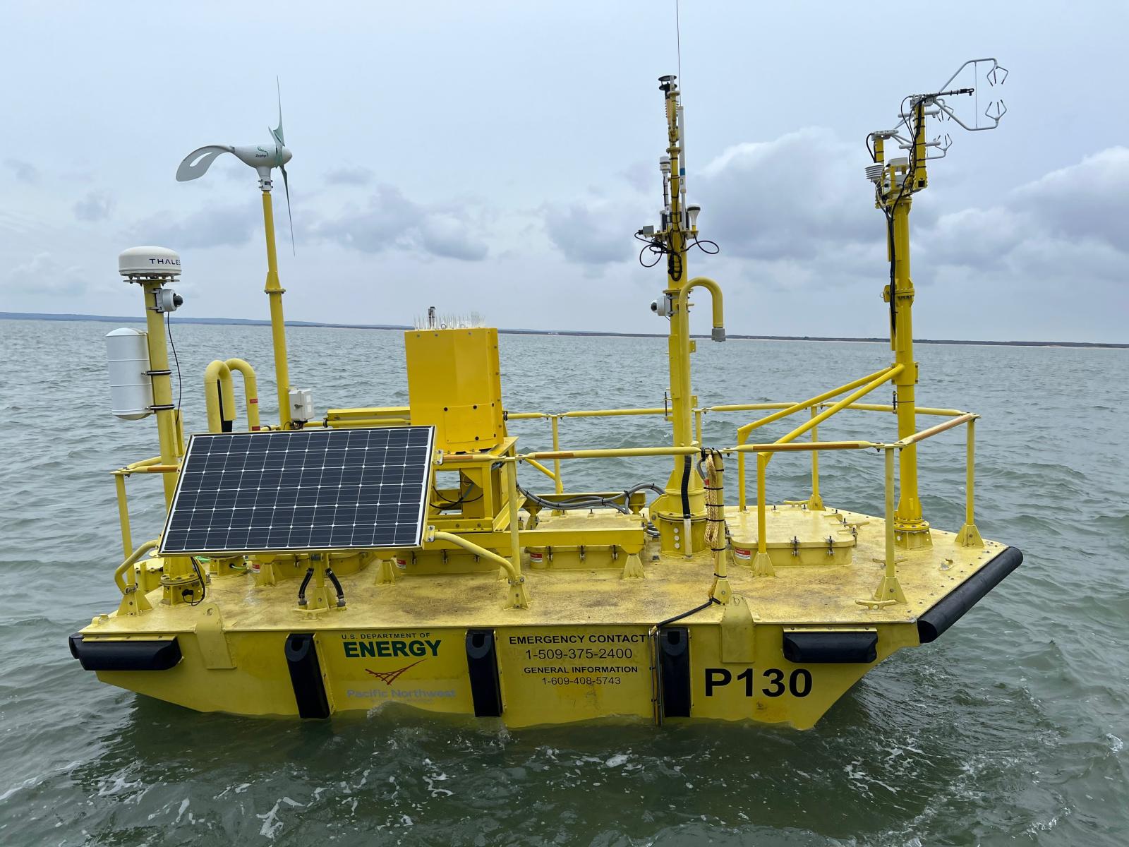 Yellow research buoy carrying scientific instruments