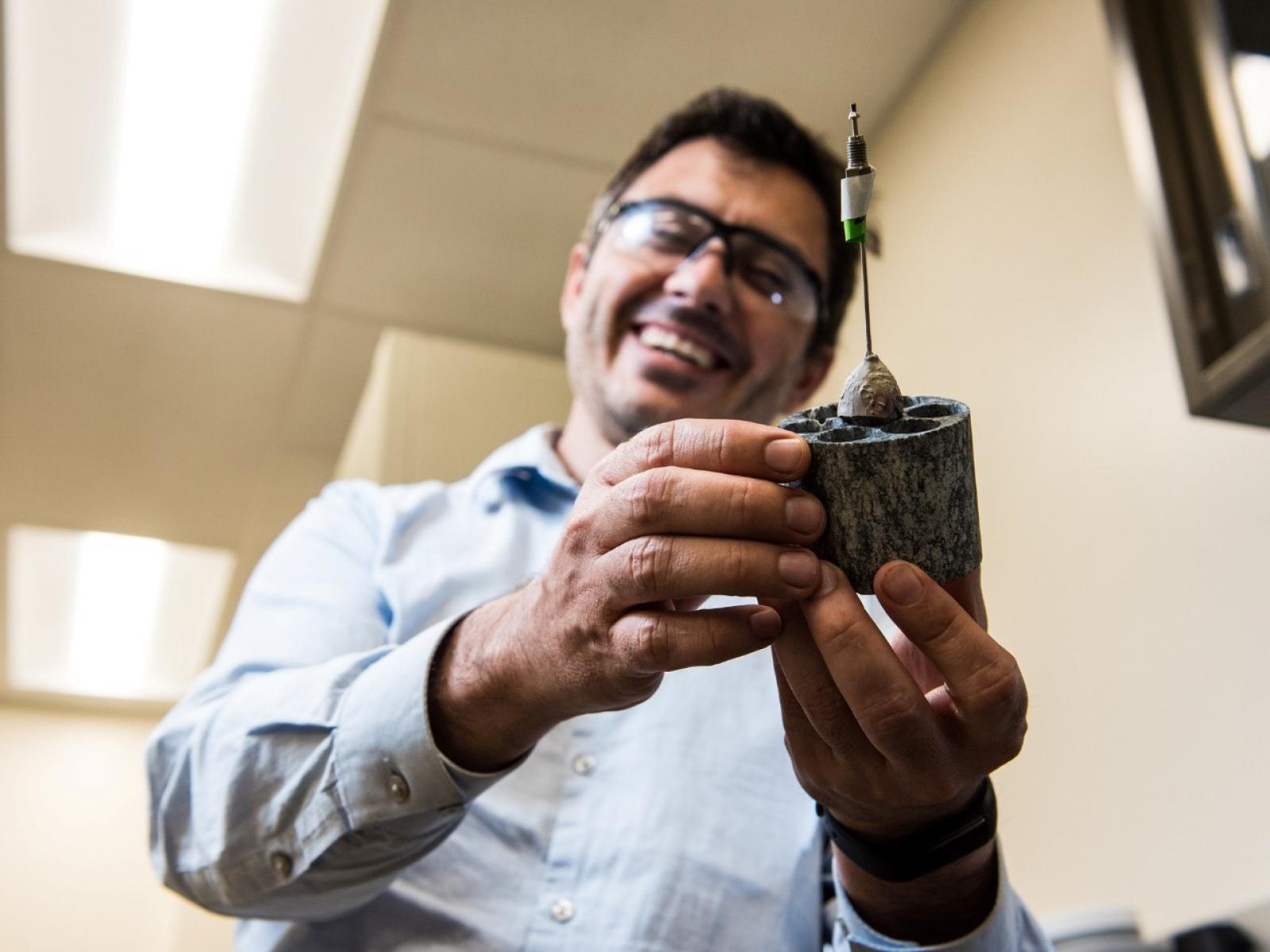 Carlos Fernandez with cement core
