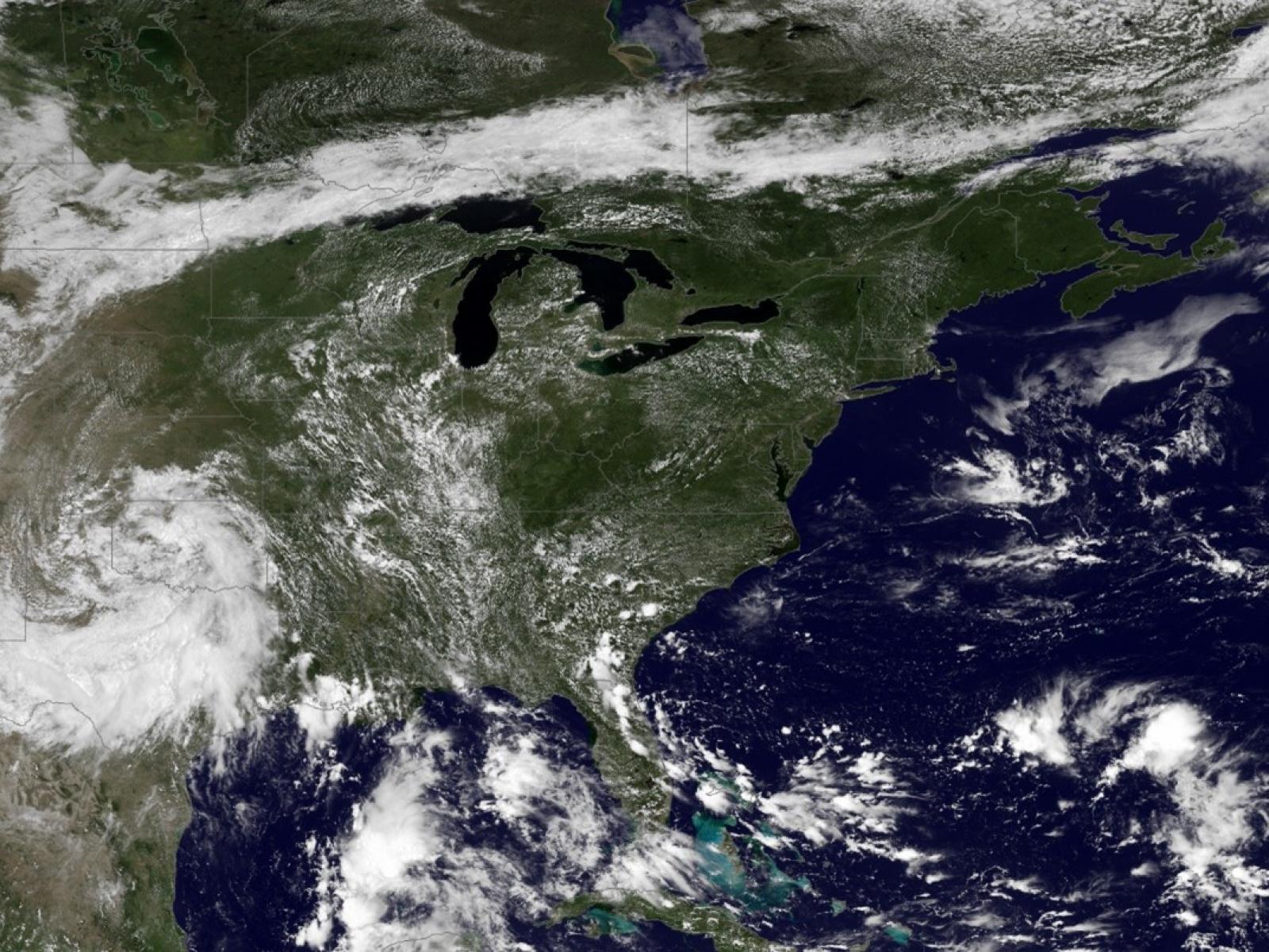 Satellite photo of swirling clouds above the US