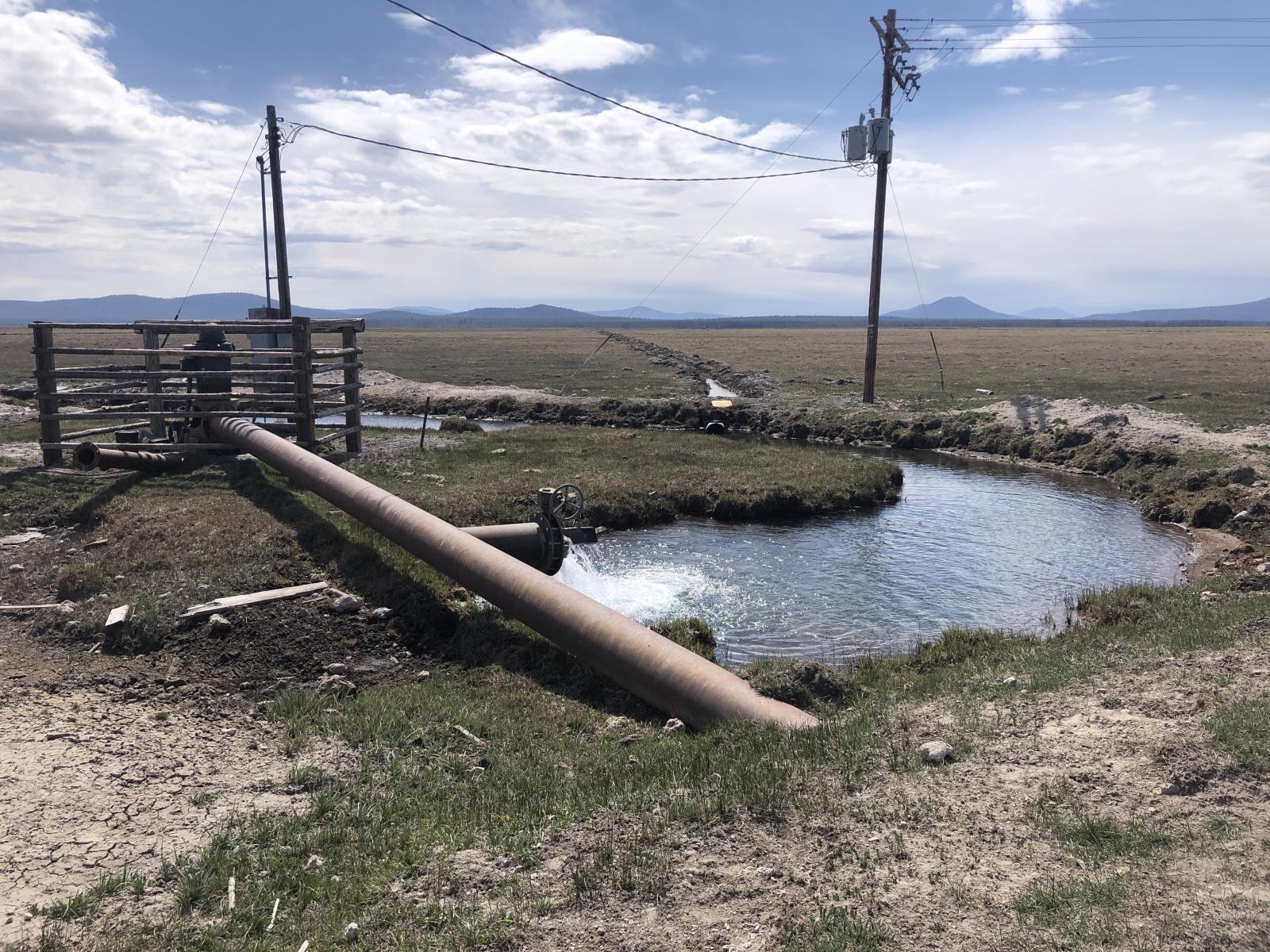 Groundwater pipeline near a body of water.