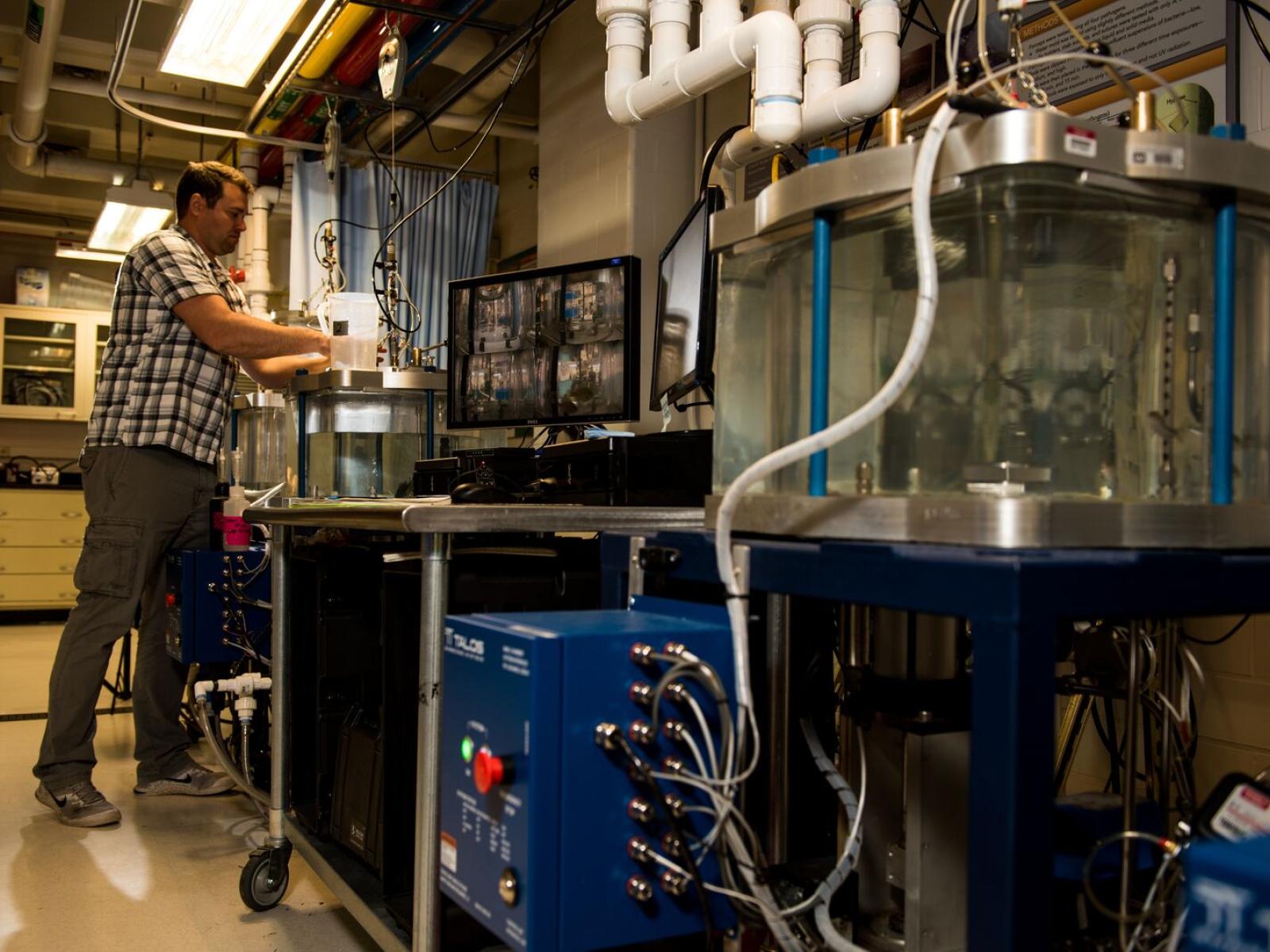 PNNL staff with computer-controlled barotrauma chambers