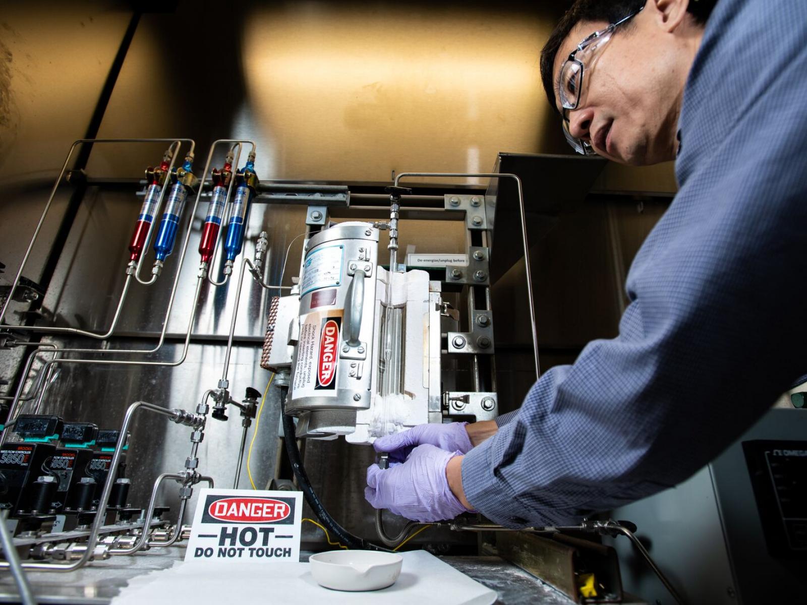 Researcher working at bench