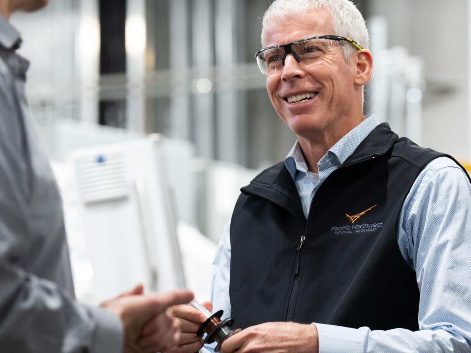 DOE Secretary Chris Wright wearing safety glasses