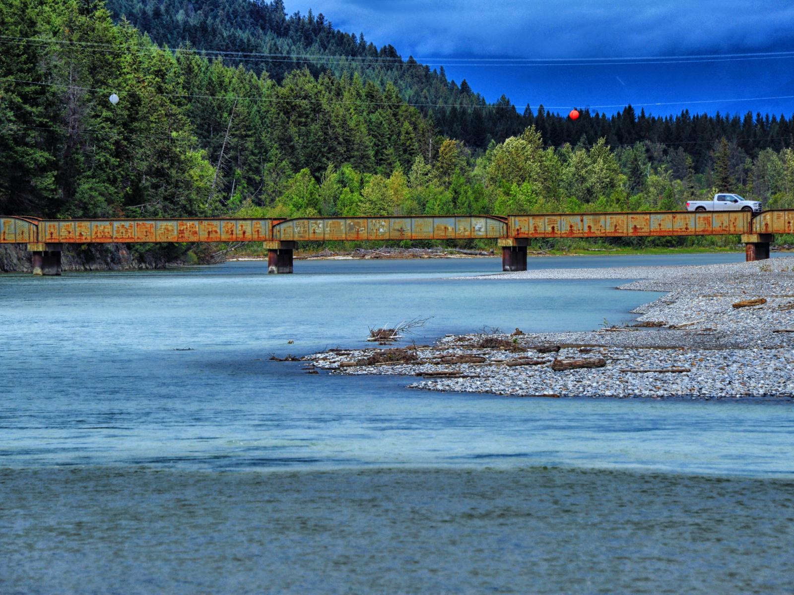 Photograph of truck crossing a bridge over the Columbia River