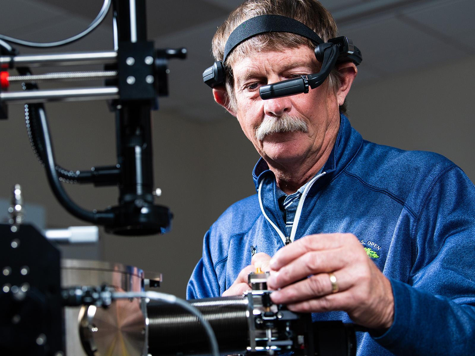 Researcher Bruce Arey uses the headset to “virtually” show other researchers how to operate a new piece of equipment.
