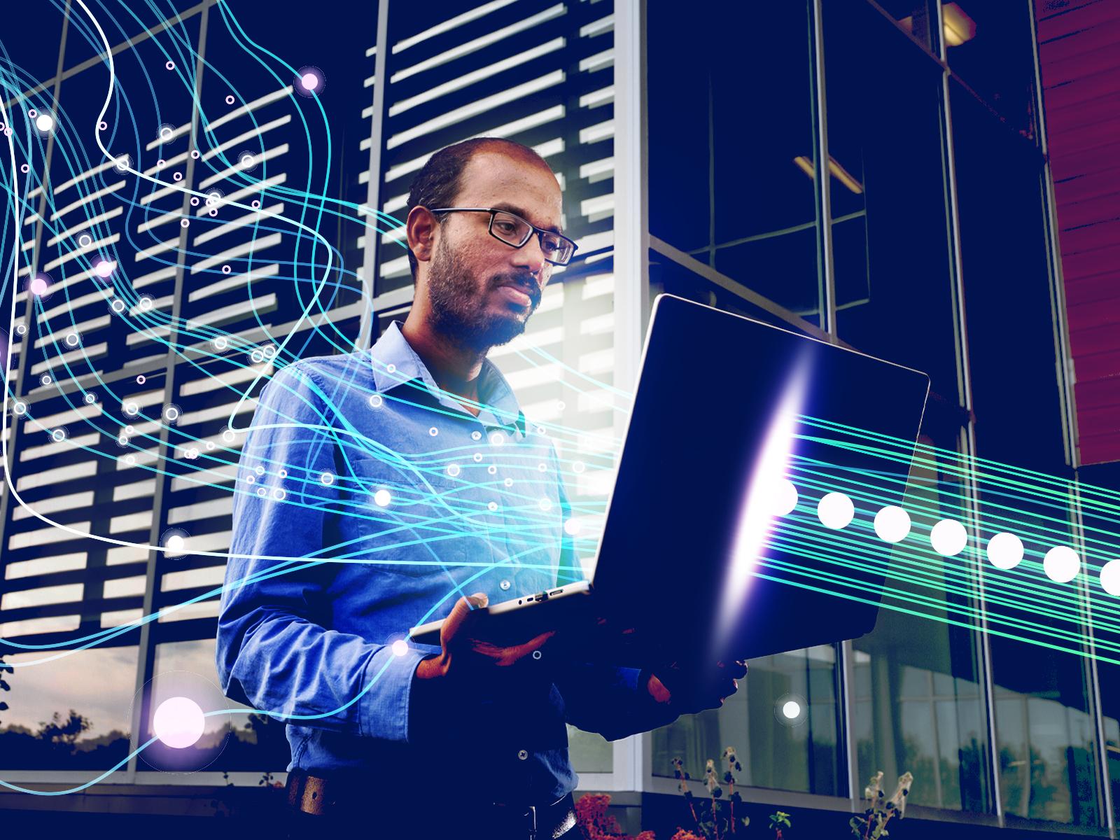 man staring at a computer monitor