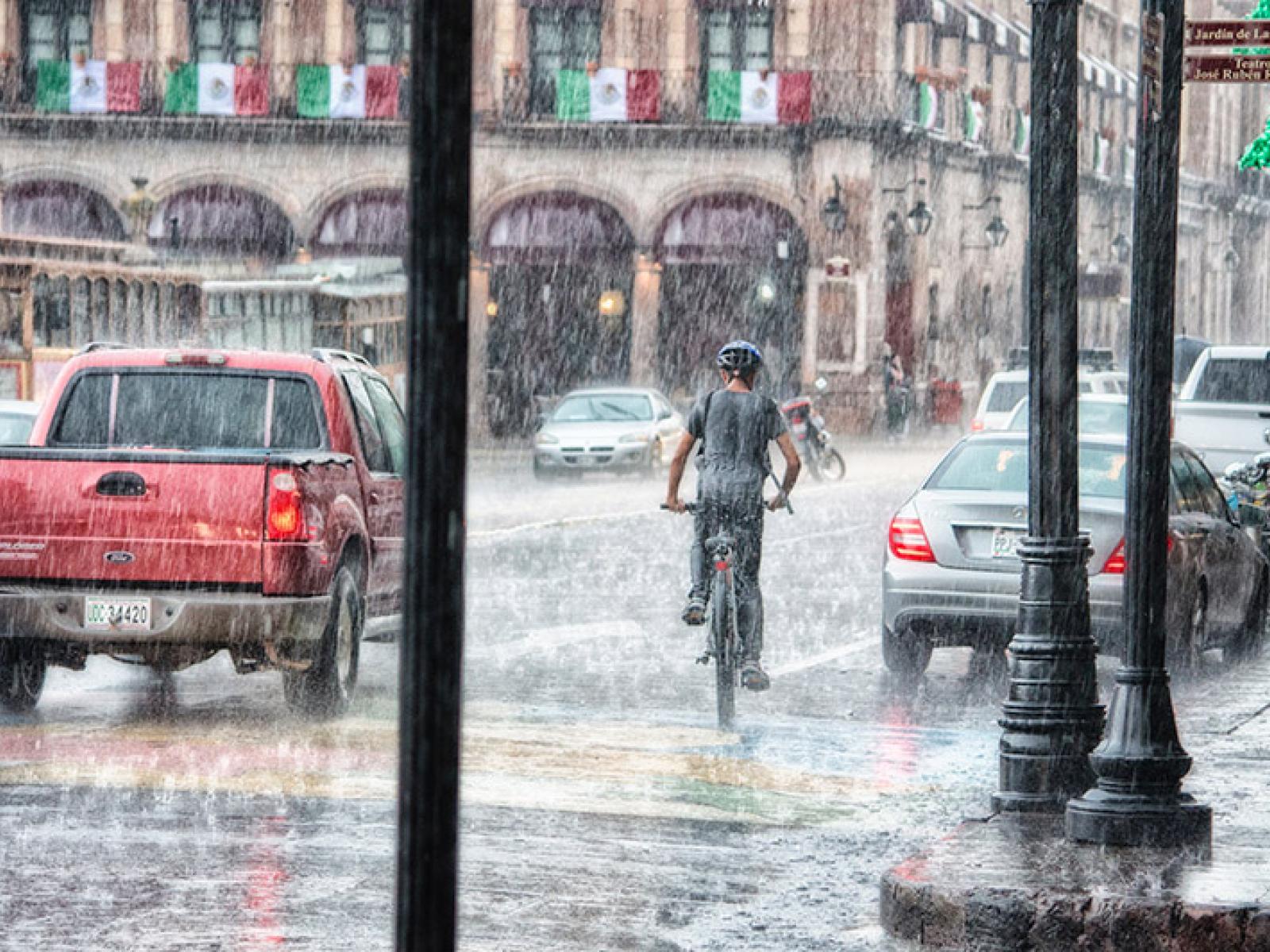 Sarangi_BikeinDownpour_UrbanRain_800px