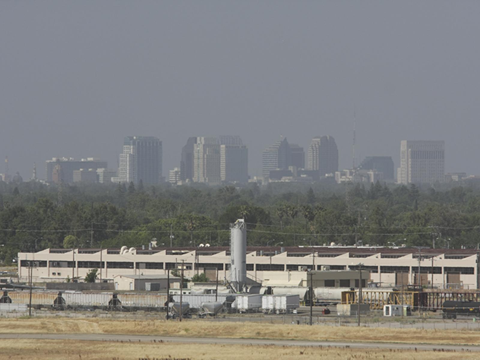 Haze obscures the Sacramento skyline