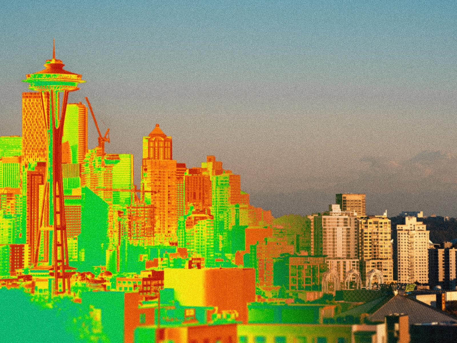 Photo of the city of Seattle with a heat map covering half of it.