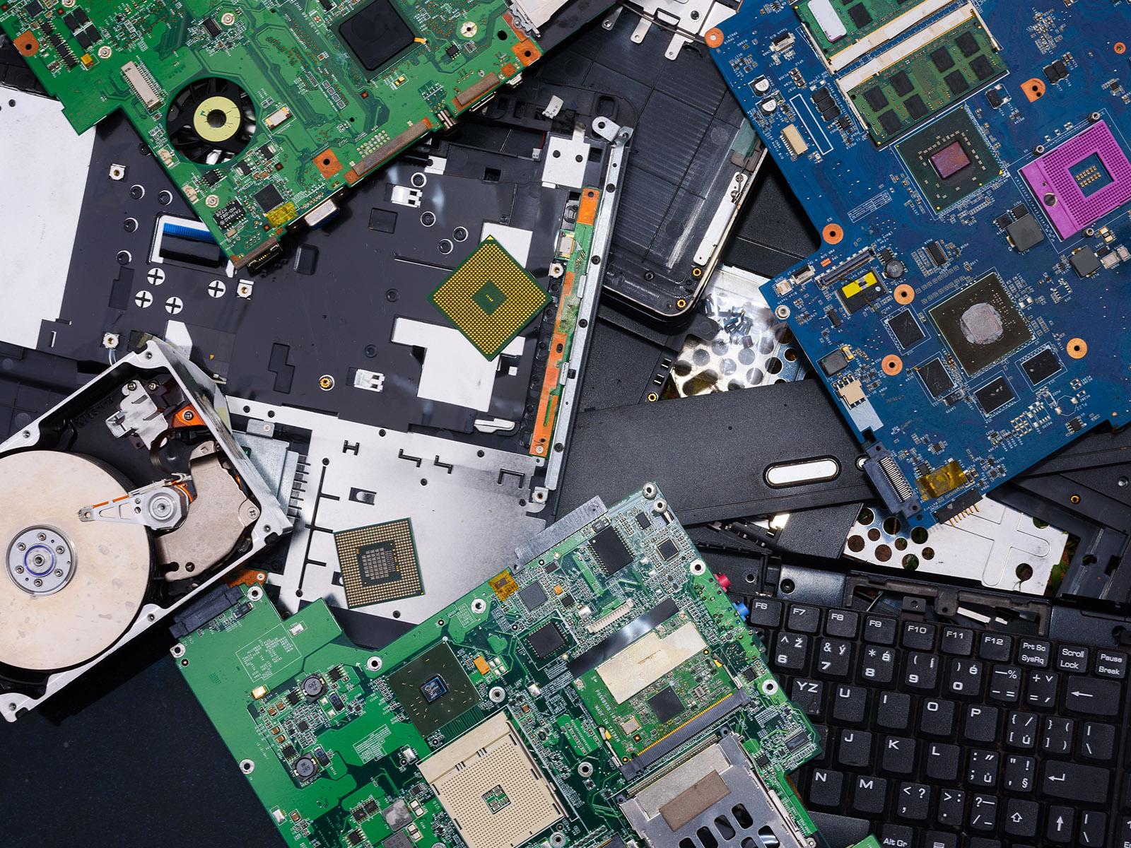 The photo shows an array of components of the insides of computers.