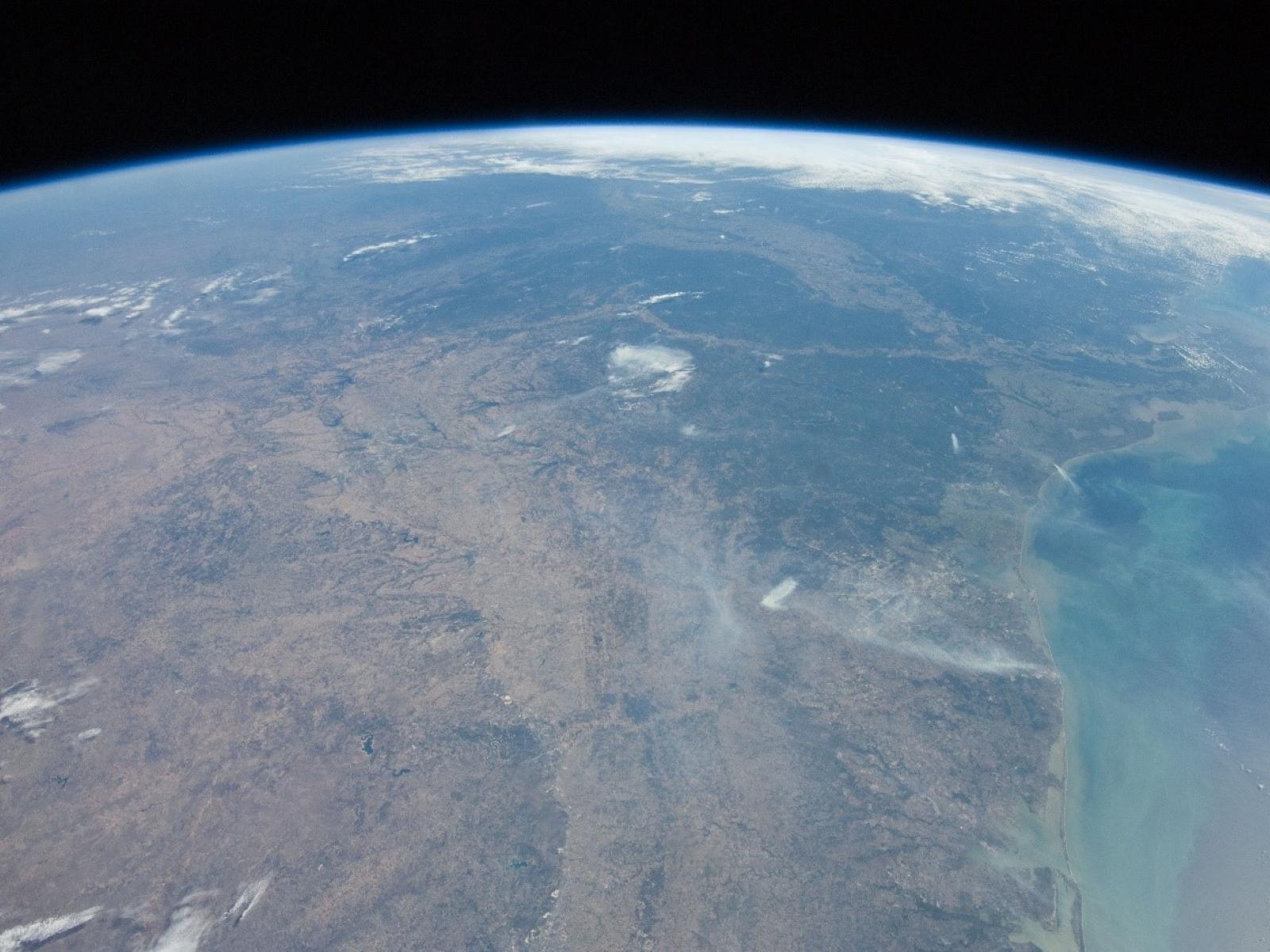 Photo of a portion of the Earth from space showing a large coastal area