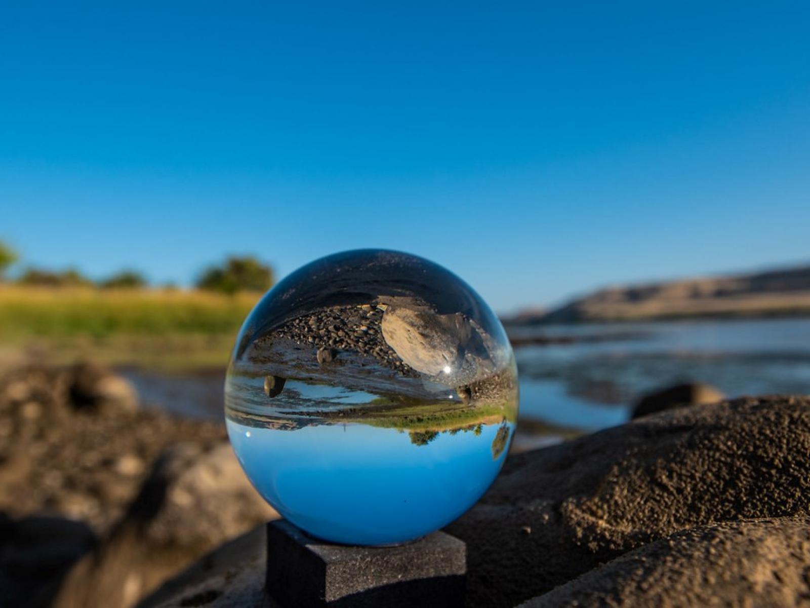 View of Hanford Reach with glass ball in foreground