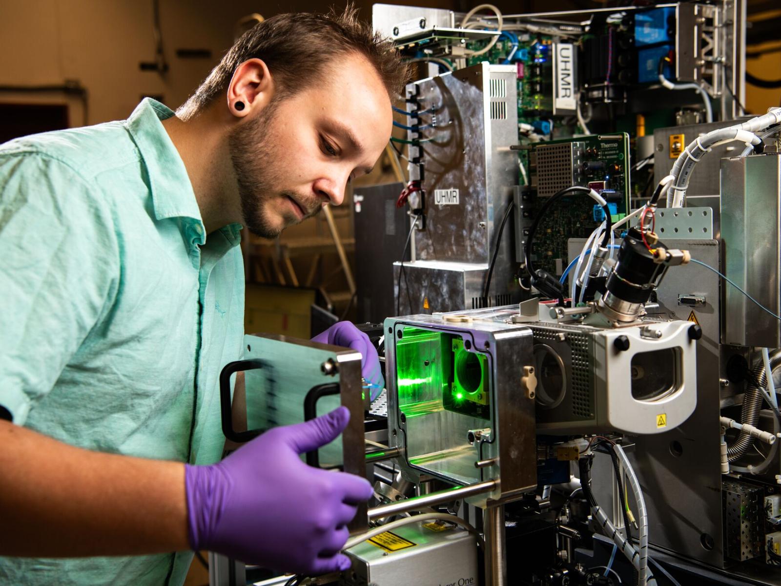 Kevin Zemaitis uses a mass spectrometer to visualize proteoforms from tissues.