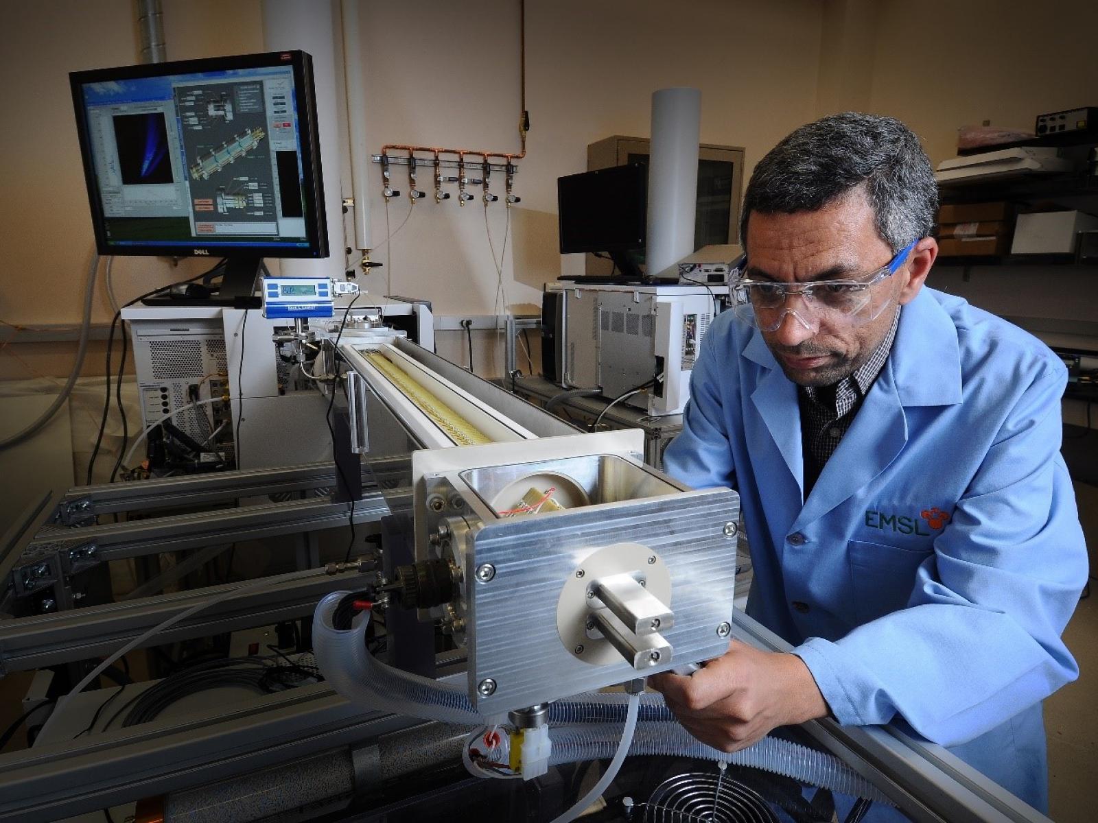 In this 2010 photo, inventive instrument maven Yehia Ibrahim works on a new Ion Mobility Spectrometry-Mass Spectrometry system.