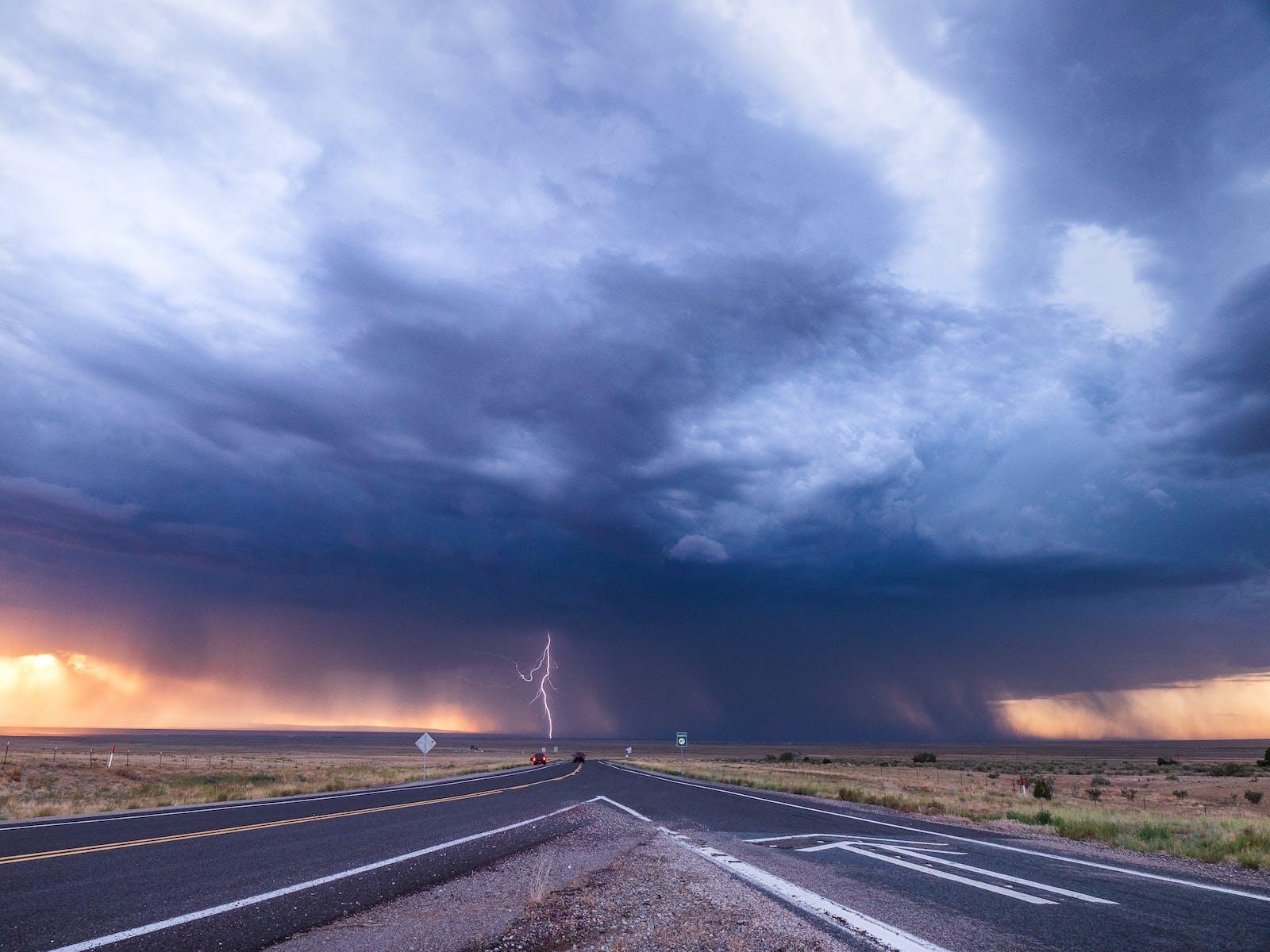 Photograph of a dramatic cloud over a highway